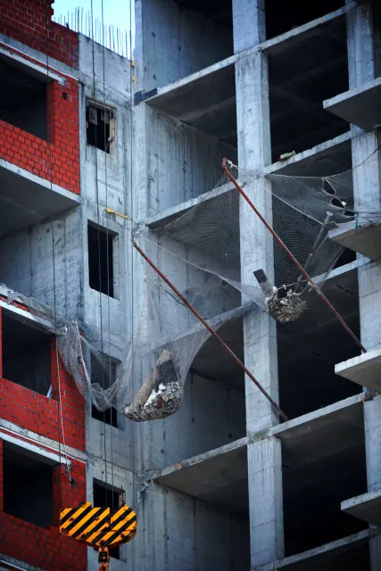 Stock reference: a multi-storey concrete building frame under construction.