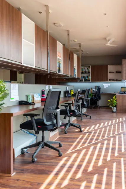Stock reference: an office interior with timber desks and natural light.